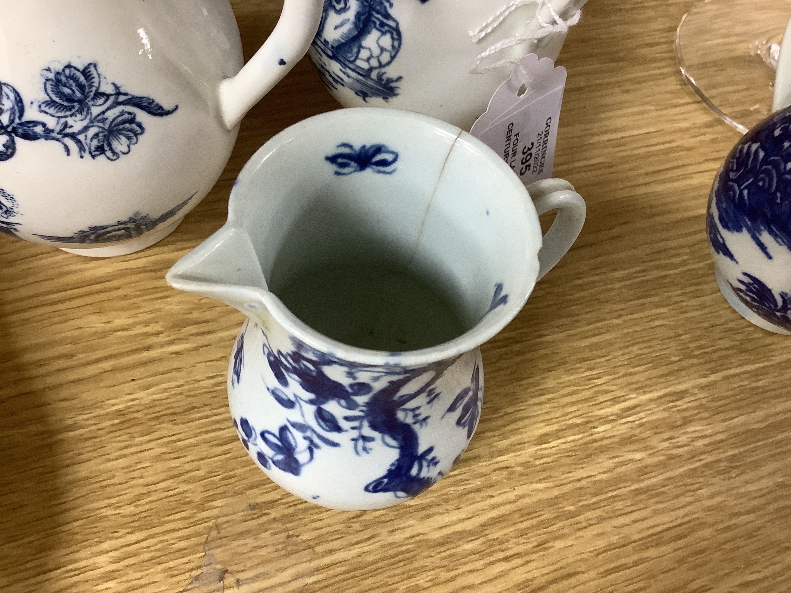 Four late 18th century Worcester blue and white sparrow beak jugs, tallest 12cm